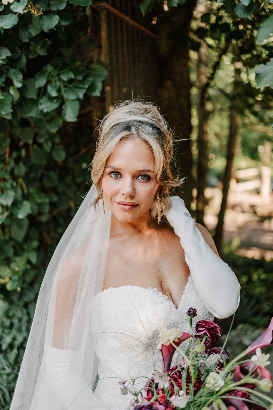 Portrait of bride MacKenzie with glowing skin on her wedding day