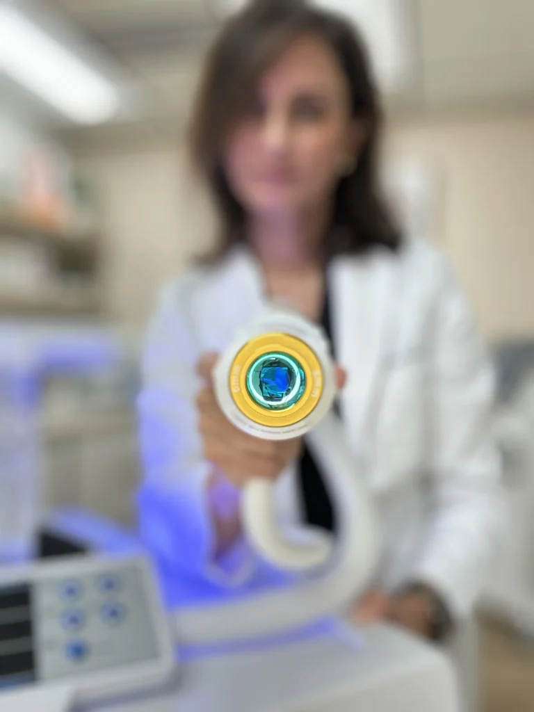 A woman with Aerolase® Neo machine